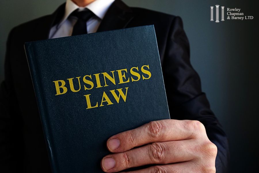 Lawyer holding Business Law Book